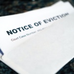 a close up of a piece of paper with a notice of eviction on it